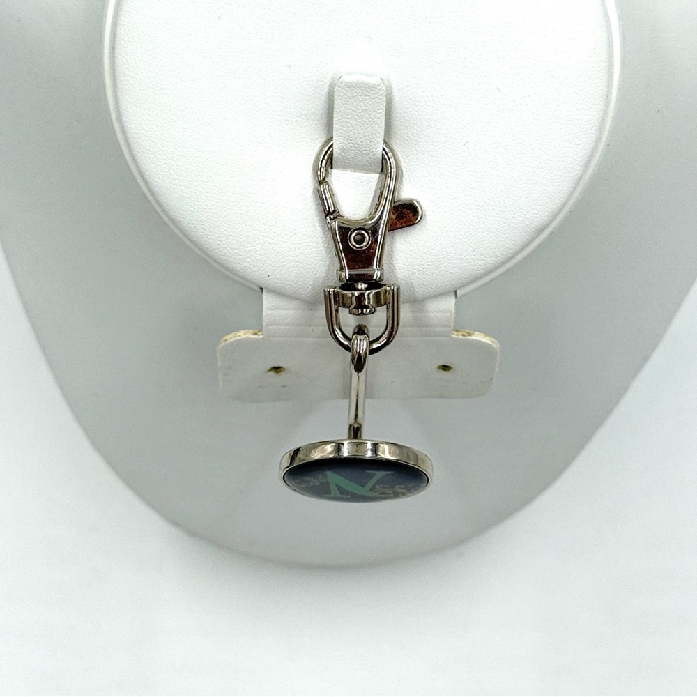 Mexx, Inc. Silver Keychain with Initial Green “N”